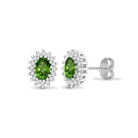 9ct white gold 25pt Natural Diamond and emerald stud earrings.